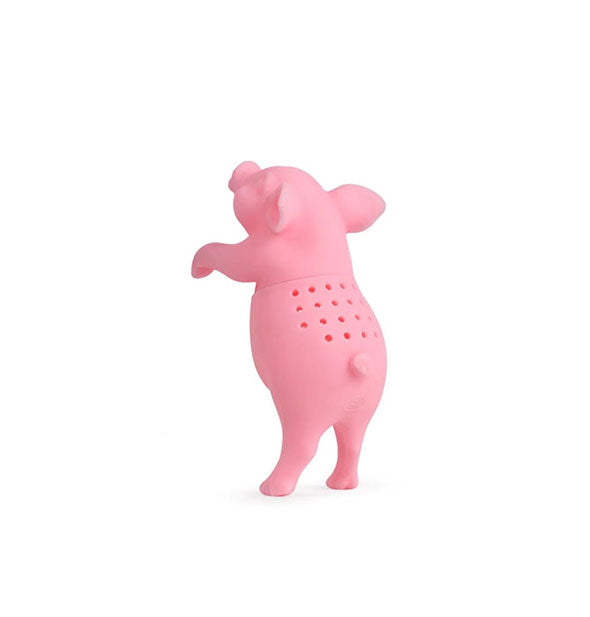 Smiling pink pig tea infuser with holes in its back