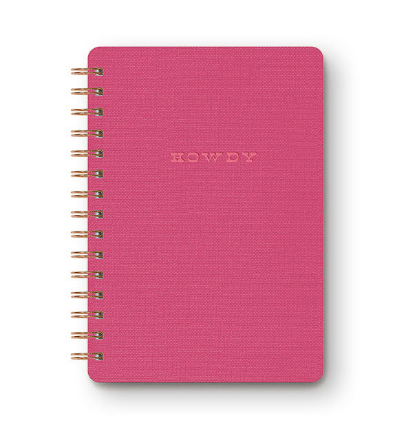 Pink journal cover with rounded corners and gold twin ring binding says, "Howdy" in debossed Western-style lettering
