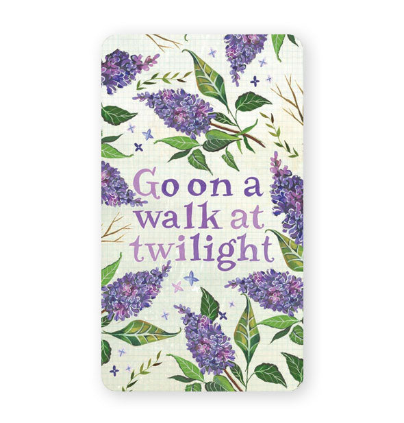 Sample card from the How to Be a Moonflower Deck says, "Go on a walk at twilight" in putple lettering amid purple lilac illustrations