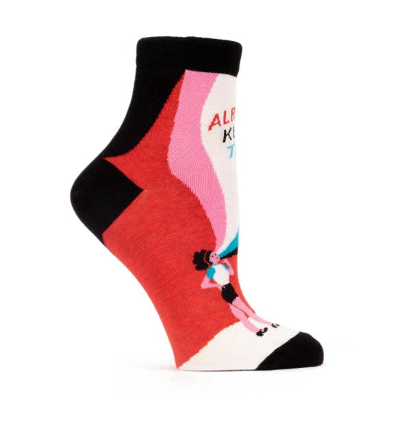 Socks with image of woman appearing to yell say, "I already knew that"