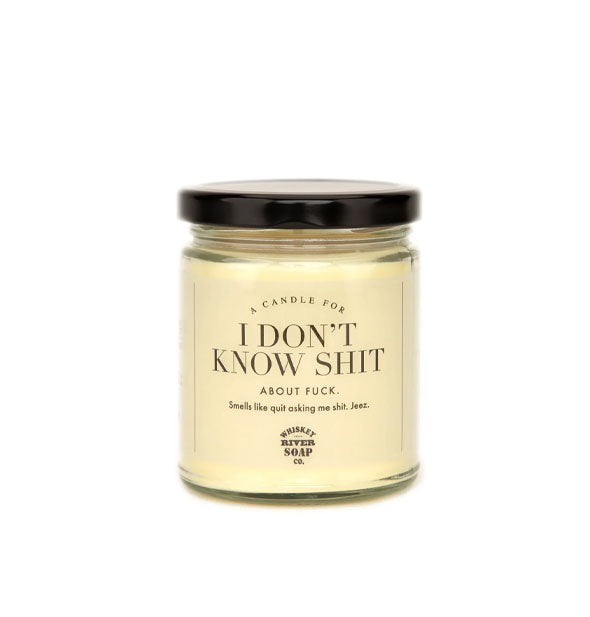 A Candle for I Don't Know Shit (About Fuck) by Whiskey River Soap Co. in a clear glass vessel with black lid