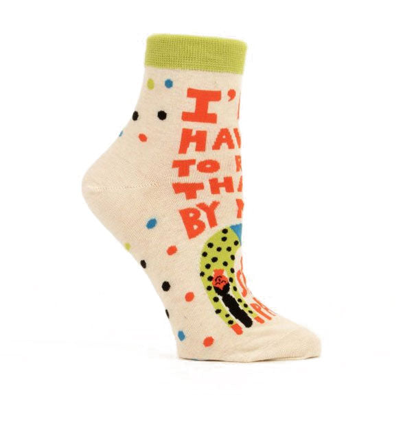 Socks with image of a woman doing a headstand say, "I'll have to run that by my sweatpants."