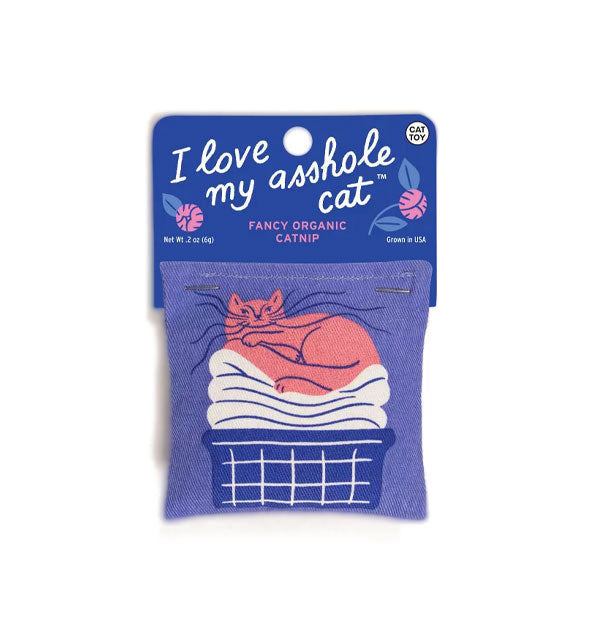 Square blue pouch of organic catnip attached to a blue product card that says, "I love my asshole cat" in white script features illustration of a long-whiskered pink cat laying on a pile of folded white towels in a laundry basket