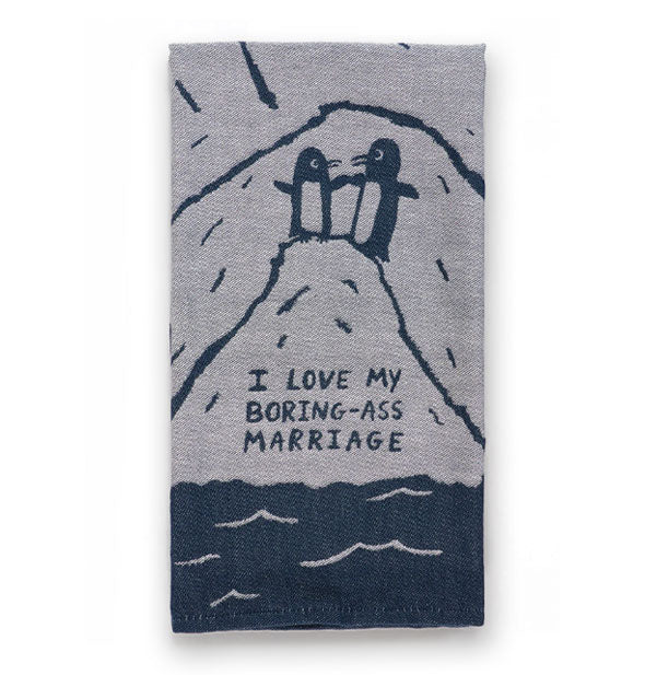 Gray and navy dish towel feature a monochromatic illustration of two penguins atop an iceberg that says, "I love my boring-ass marriage"