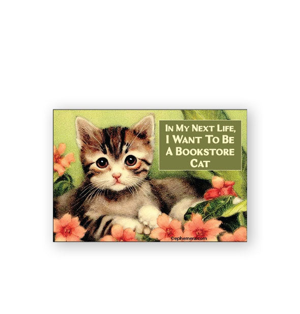 Rectangular magnet features wistful illustration of a tabby cat resting in a flower bed and the caption, "In my next life, I want to be a bookstore cat"