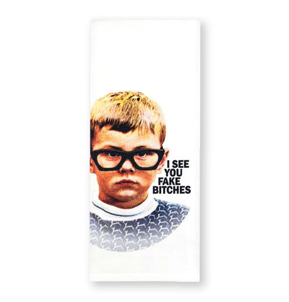White dish towel with image of a child wearing thick-rimmed glasses says, "I see you fake bitches"