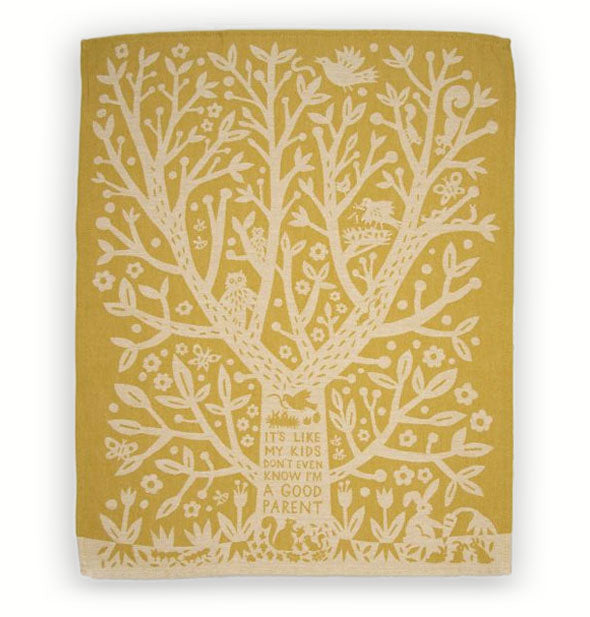 Mustard yellow dish towel with central tree design surrounded by flowers, bees, and a family of squirrels says, "It's like my kids don't even know I'm a good parent" below a nest of chicks being fed a worm by a bird