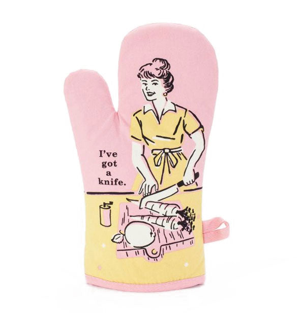 Pink and yellow oven mitt with illustration of a woman chopping vegetables says, "I've got a knife."
