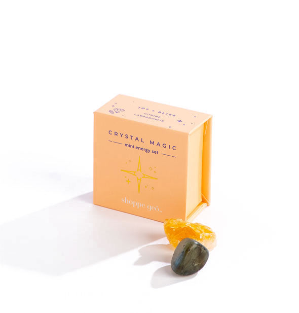Small orange square Crystal Magic Mini Energy Set box with orange citrine and dark labradorite stones in the foreground