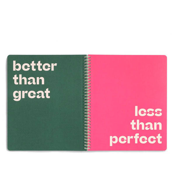 Open notebook with spiral-bound green and pink pages that say, "Better than great" and "Less than perfect"