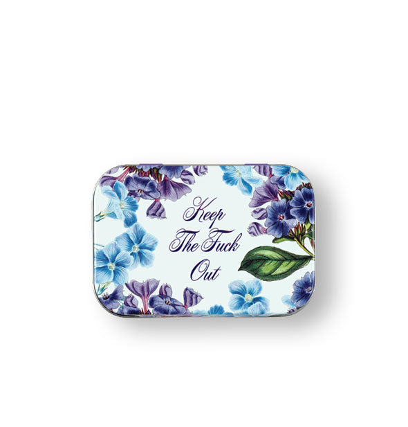 Rectangular tin box lid with rounded corners and purple and blue flower illustrations says, "Keep The Fuck Out" in the center in purple script lettering