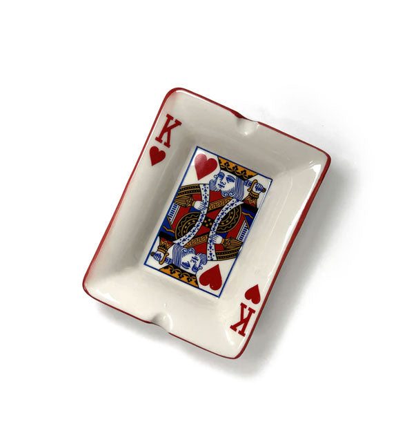 Rectangular white ashtray with painted King of Hearts playing card design and two grooves on its rim