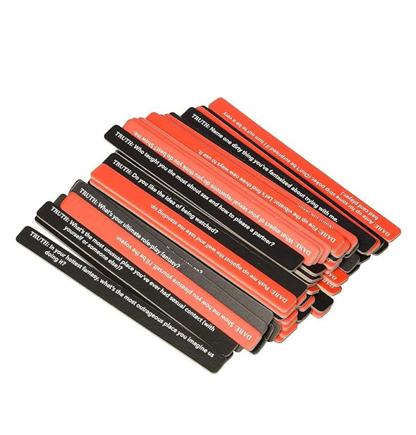 Collection of black and red Kinky Truth or Dare sticks