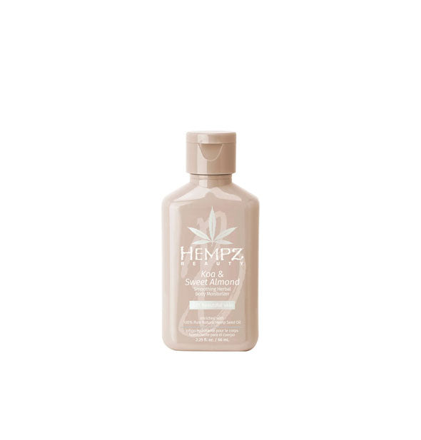 Beige 2.25 ounce bottle of Hempz Koa & Sweet Almond Smoothing Herbal Body Moisturizer with white and silver lettering and design accents
