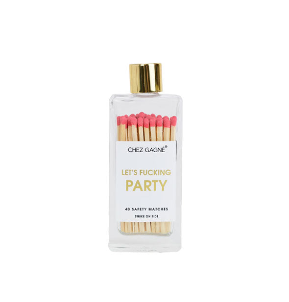 Rectangular glass bottle containing 40 coral-tipped Chez Gagné safety matches and topped with a gold lid says, "Let's fucking party" in gold foil