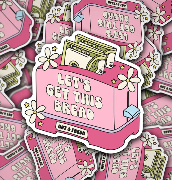 Pile of stickers feature illustration of pink toaster that says, "Let's get this bread" with 100 dollar bills in the slots and "Hot & Fresh" in smaller print at the bottom