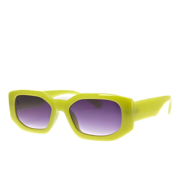 Angular sunglasses with lime green frames and grayish-purple gradient lenses
