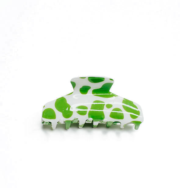 White claw clip with lime green cow print spots