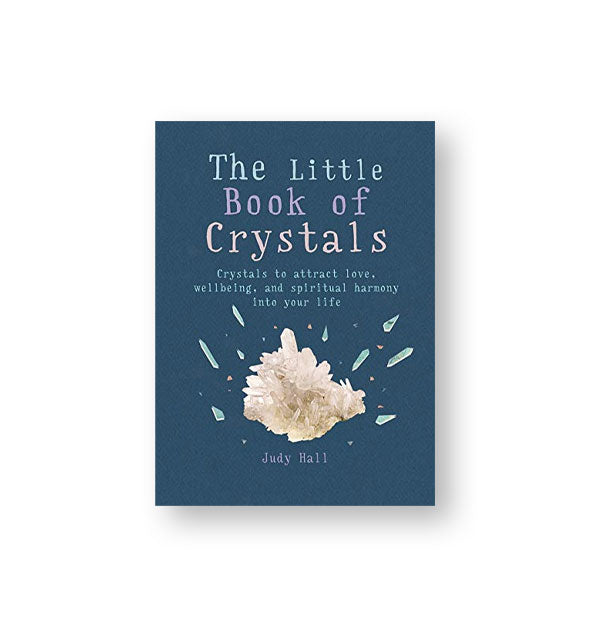 Dark blue cover of The Little Book of Crystals by Judy Hall features image of a piece of whitish quartz