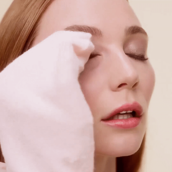 Model demonstrates eye makeup removal using circular strokes with the Jane Iredale Magic Mitt