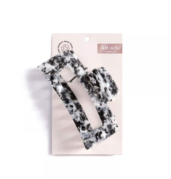 Black and white marbled claw clip by Kitsch on pink product card