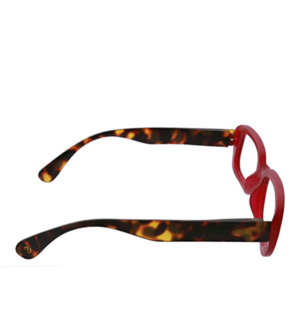 Side view of red and brown tortoise reading glasses