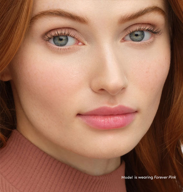 Model wearing Forever Pink shade of Jane Iredale Just Kissed Lip and Cheek Stain