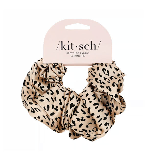 Leopard print Recycled Fabric Scrunchie hangs from a light pink Kitsch product card