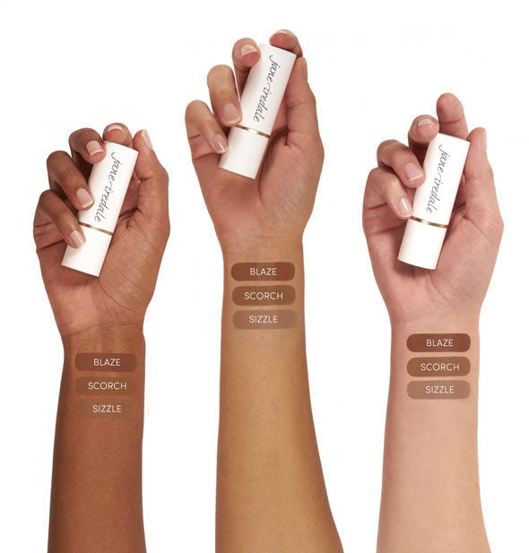 Three models' arms each with three shades of Jane Iredale's Glow Time Bronzer Stick applied