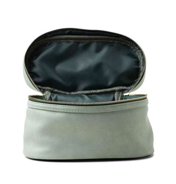 Sagey-green vegan leather travel case with forest green zipper tape and gold-toned zipper is opened to show forest green nylon lining