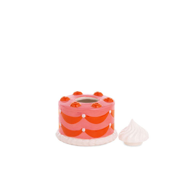 Cake match holder with white "icing" lid removed