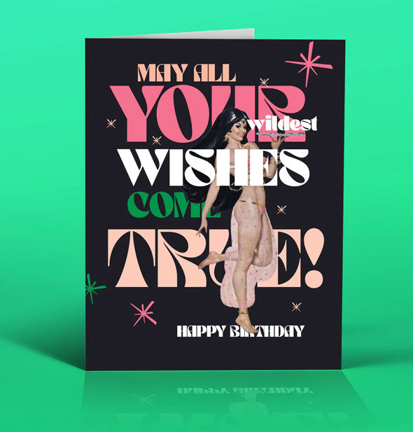 Black greeting card on green backdrop features image of a retro-styled woman dressed as a genie and the message, "May all your wildest wishes come true! Happy birthday"