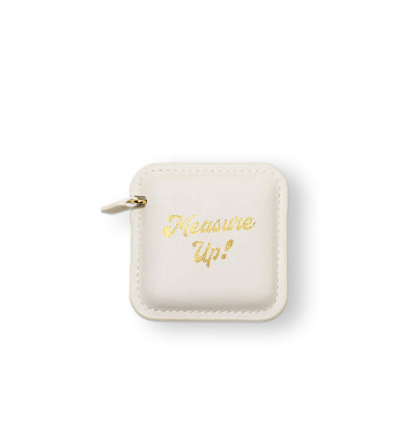Square stitched white vegan leather measuring tape holster with pull tab says, "Measure Up!" in metallic gold foil lettering
