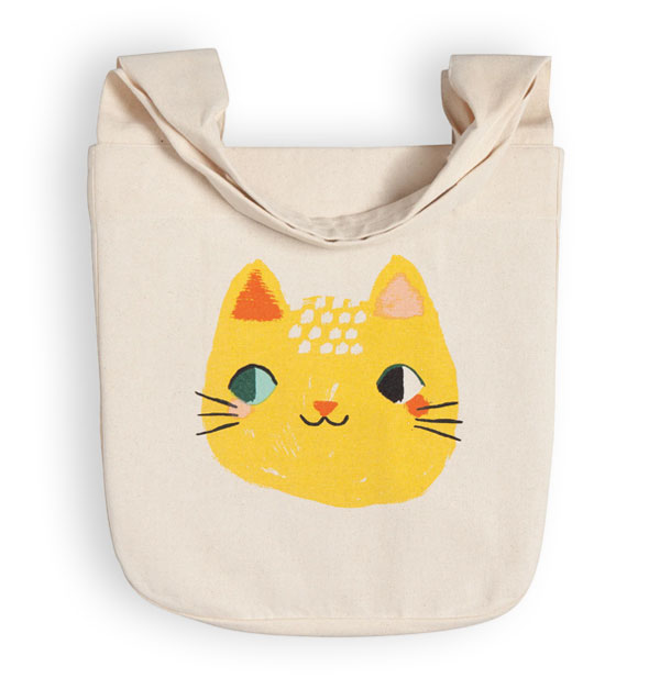 Linen tote bag with wide handles and smiling yellow cat face illustration