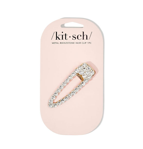 Alligator-style hair clip covered in clear rhinestones is attached to a light pink Kitsch product card