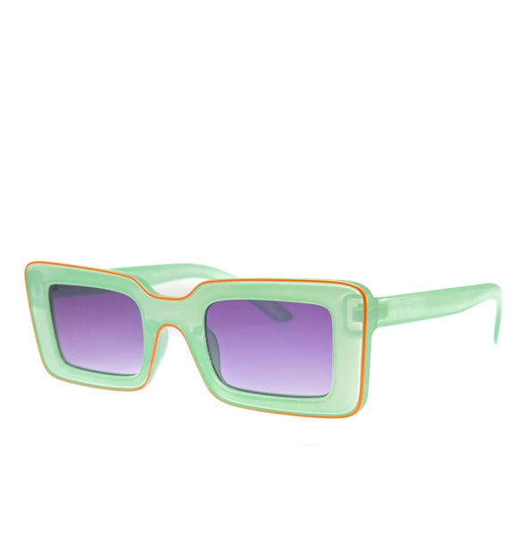 Pair of rectangular mint green sunglasses with an orange pinstripe and purple lenses