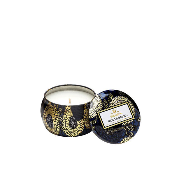 Black and gold metallic Moso Bamboo Voluspa candle tin with lid removed