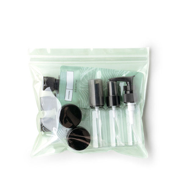 The Jet Set 11-Piece Travel Kit pouch in moss green color option