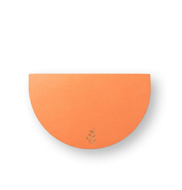 Orange half-circle notepad with gold mushroom artwork at the bottom