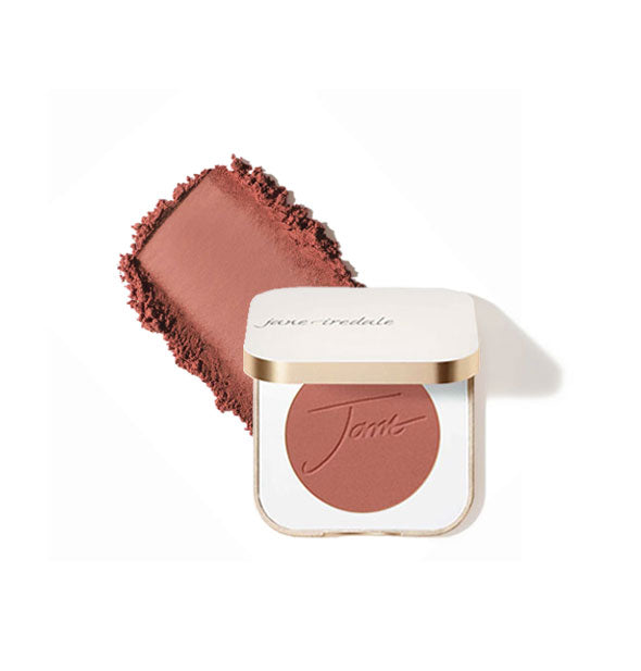 Opened square white and gold Jane Iredale compact reveals blush shade Mystique inside