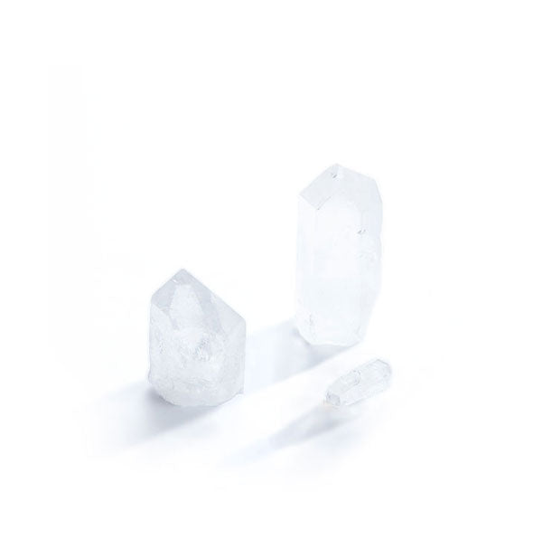 Three pieces of clear quartz crystal