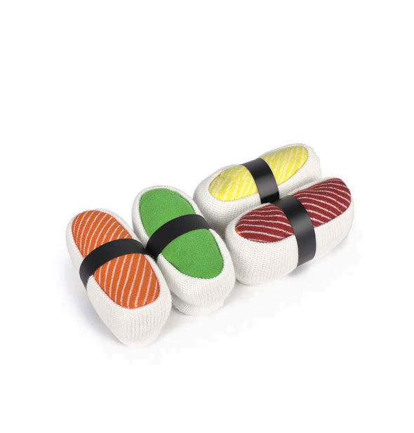 Four rolled-up socks resembling pieces of sushi