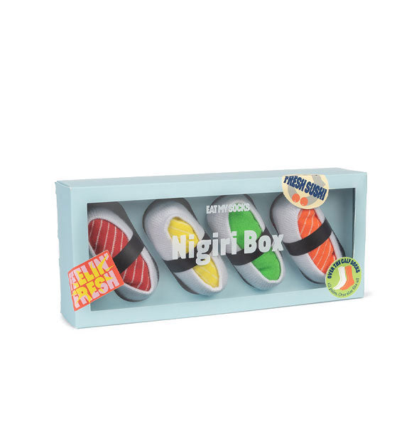 Nigiri Box socks packaging through which four rolled-up socks resembling sushi rolls can be seen
