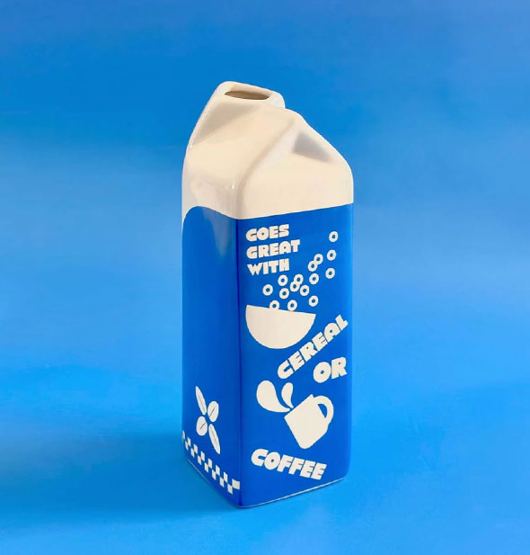 Back of Oat MIlk Carton Vase says, "Goes great with cereal or coffee" with bowl and mug graphics