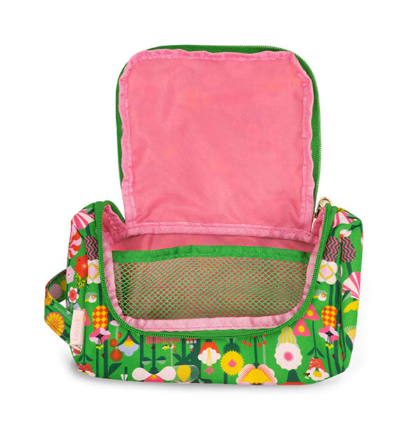 Opened Geometric Floral On the Go Pouch reveals a pink interior with green mesh partition