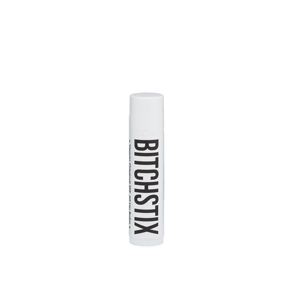 White tube of Bitchstix lip balm with black lettering