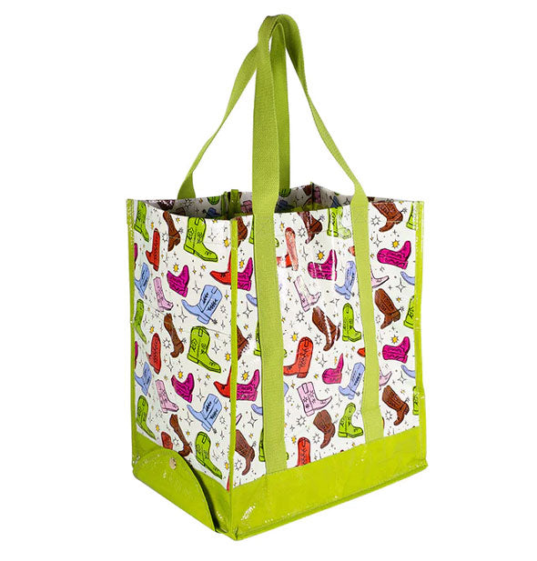 Three-quarter view of boot print tote bag with green details