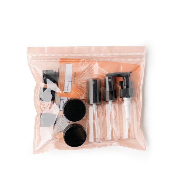 The Jet Set 11-Piece Travel Kit pouch in peach color option