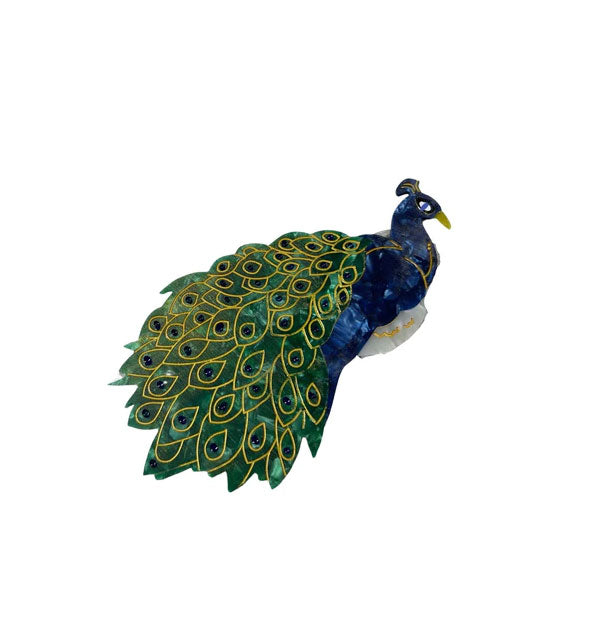 Hair clip designed and painted to resemble a peacock