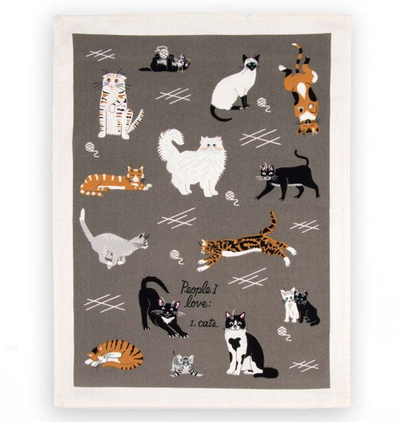 Gray dish towel with white border features illustrations of cats in various colors and patterns arranged around the words, "People I love: 1. Cats"